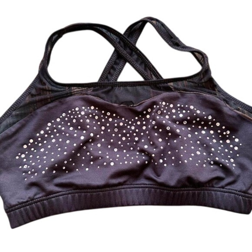 Black sports bra with shorts sparsely dots and mesh straps . Size: L